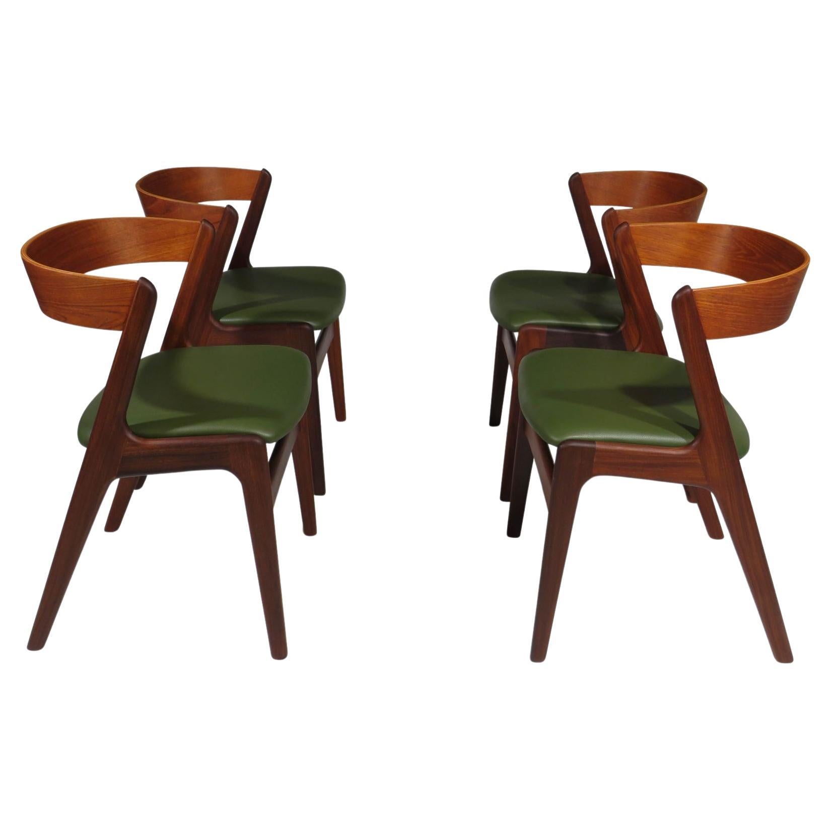 Four Danish Teak Curved Back Dining Chairs