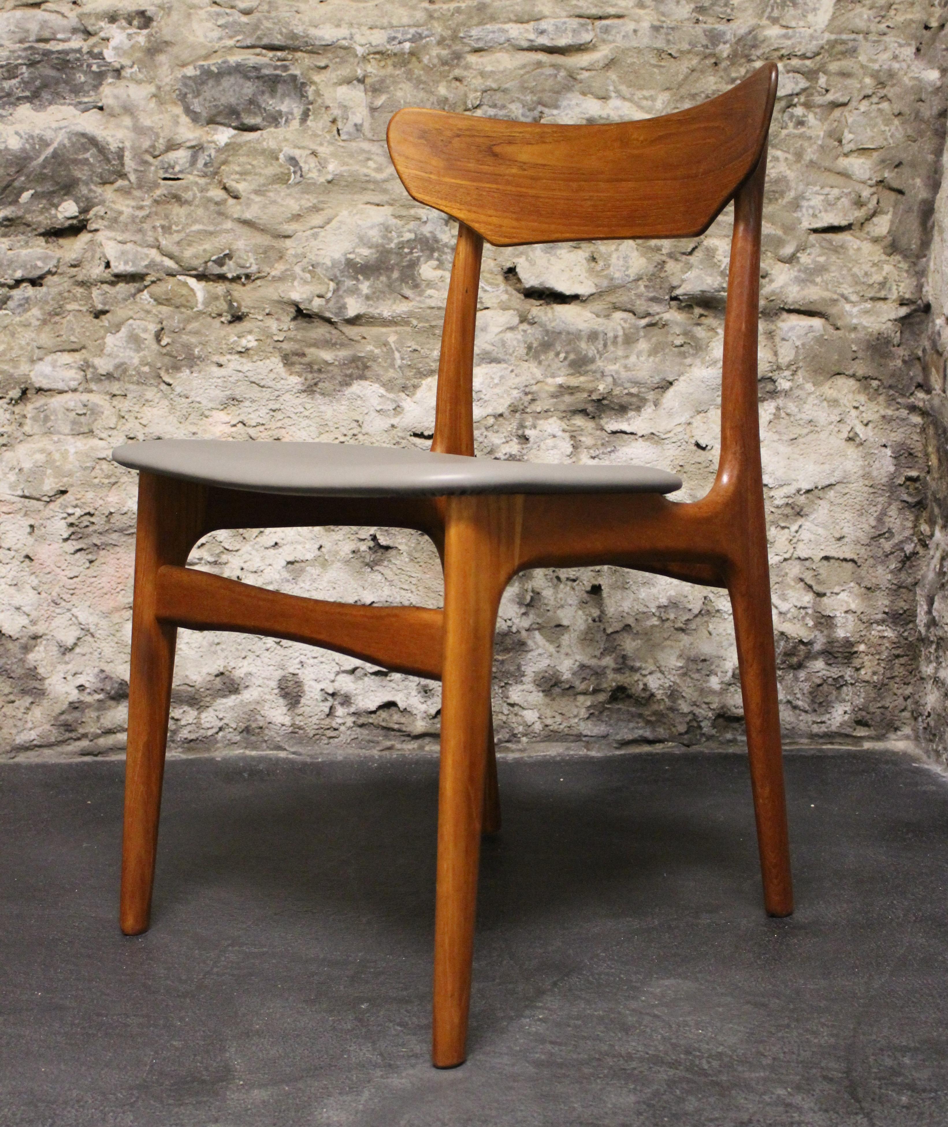 Four Danish teak dining chair by Schionning and Elgaard for Randers. Newly upholstered in leather.