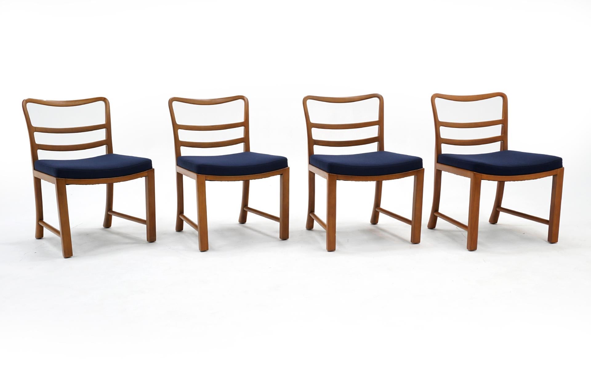 Set of four dining chairs designed by Edward Wormley for Dunbar. Bleached mahogany frames and blue upholstery.