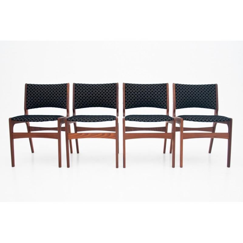 Set of four teak chairs, designed by the famous Danish designer Johannes Andersen. Chairs were manufactured in Denmark in the 1960s. Preserved in very good condition, new dark soft upholstery.