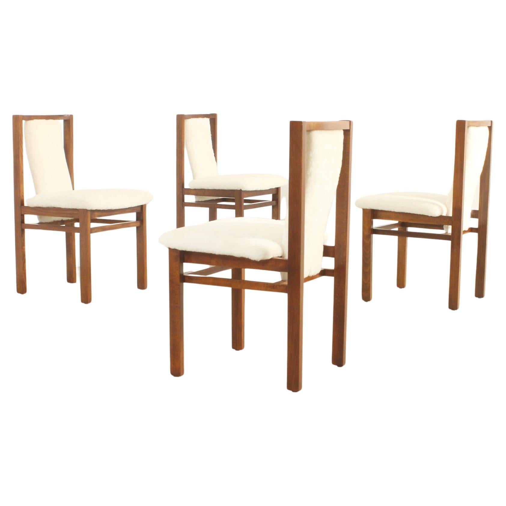 Four Dining Chairs by Jordi Vilanova in Oak Wood and Sheepskin, Spain, 1960's For Sale