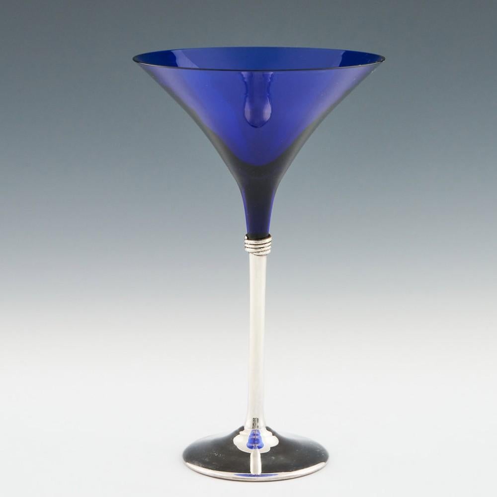 Four Domar Glass and Sterling Silver Cocktail Glasses, 1991

Additional Information:
Heading : Four Domar Glass and Sterling Silver Cocktail Glasses
Period : 1991
Origin : Jerusalem, Israel
Colour : Blue glass and 925 silver stems and feet
Bowl :