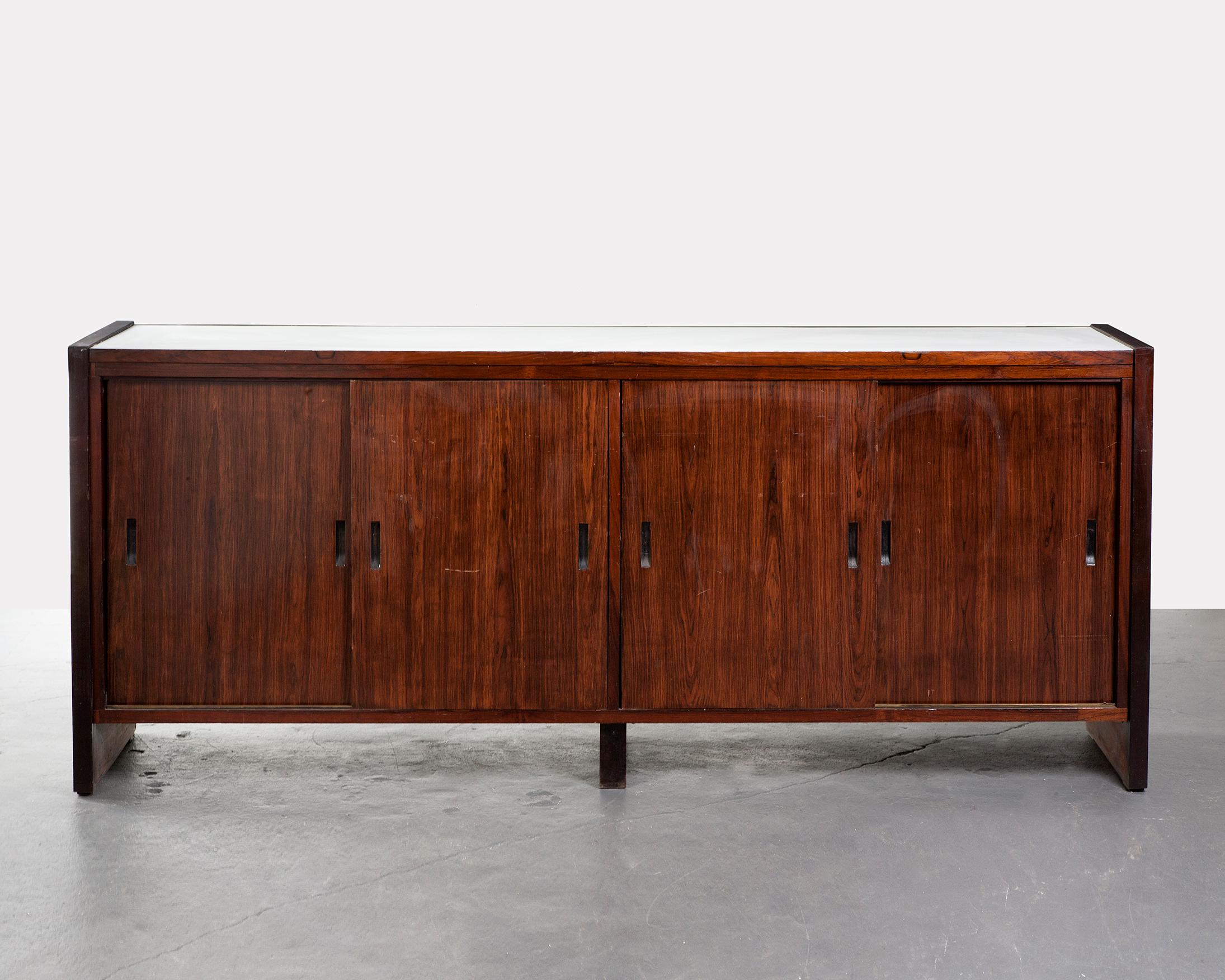Four-door credenza in rosewood with white formica top and sides, Brazil, 1960s.