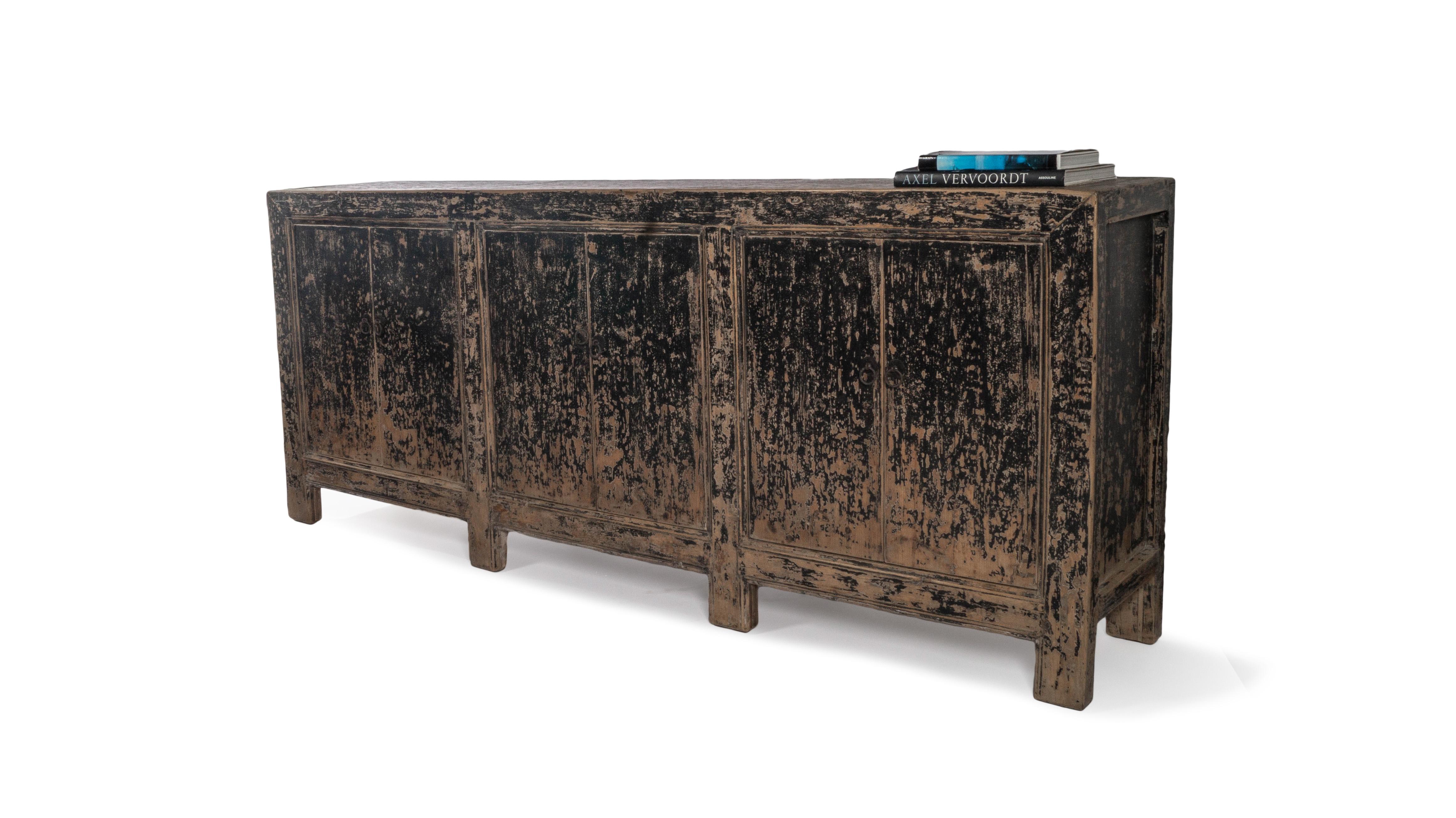 This four door server features a distressed ebony patina and is the perfect storage piece for any room in your home.

This piece is a part of one-of-a-kind collection, Le Monde. French for “The World”, the Le Monde collection is made up of rare