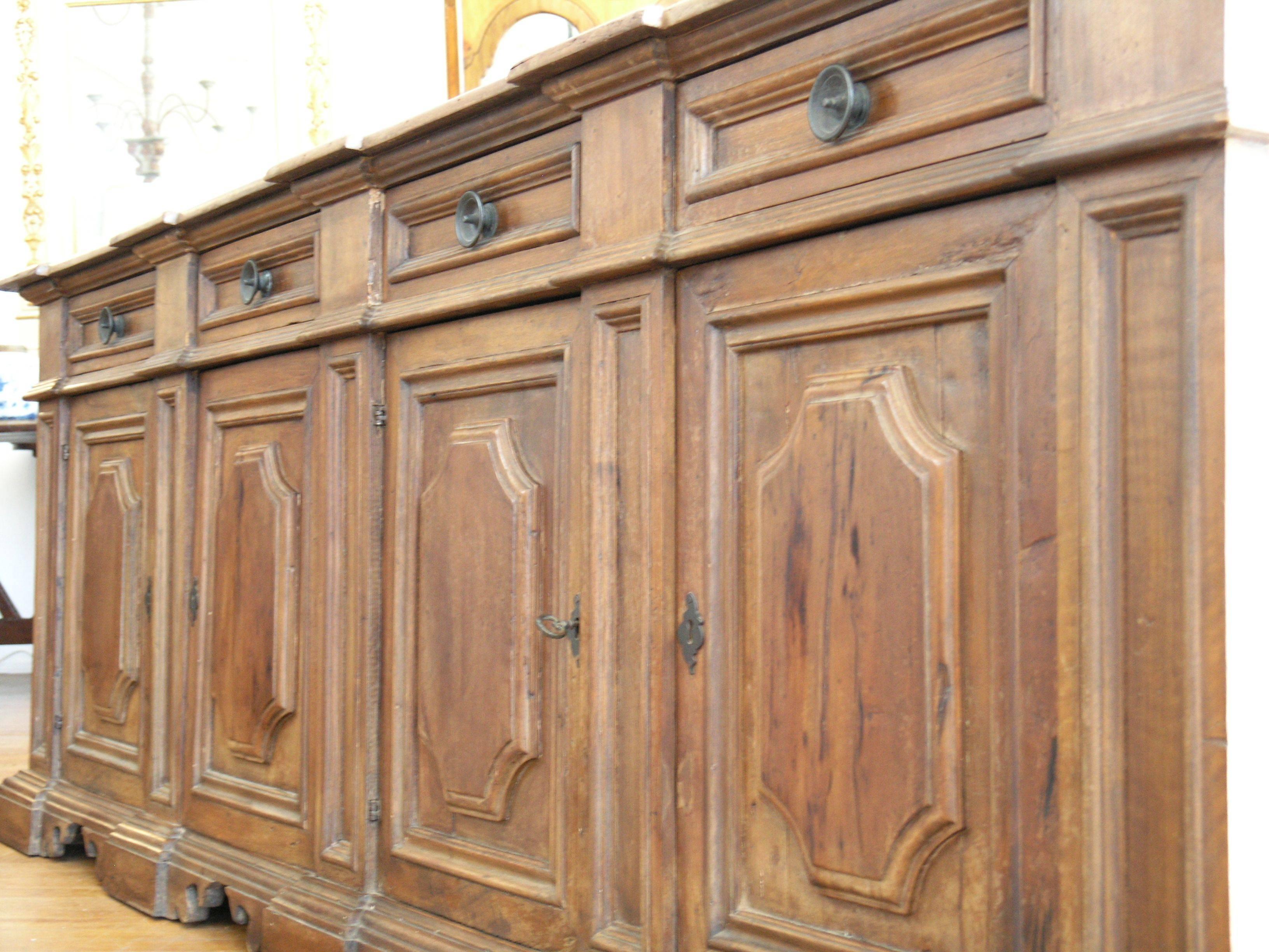 Carved Four-Door Tuscan Walnut Credenza For Sale