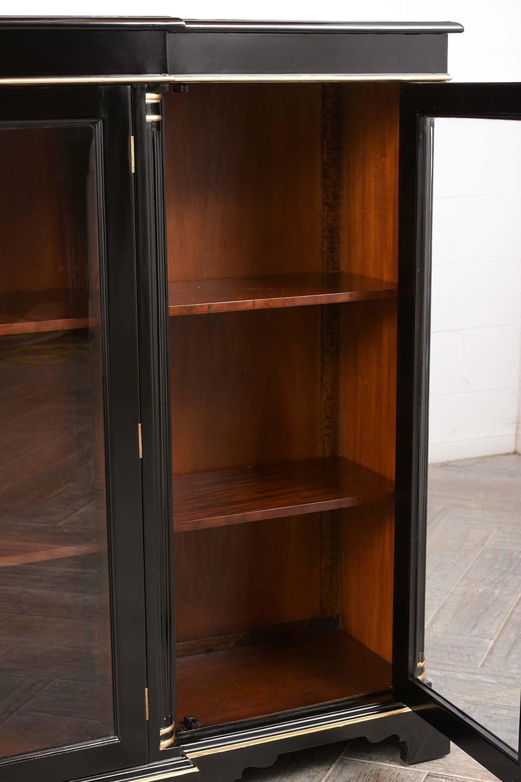 Gilt Four Doors Regency Style Bookcase with a Black Lacquered Finish