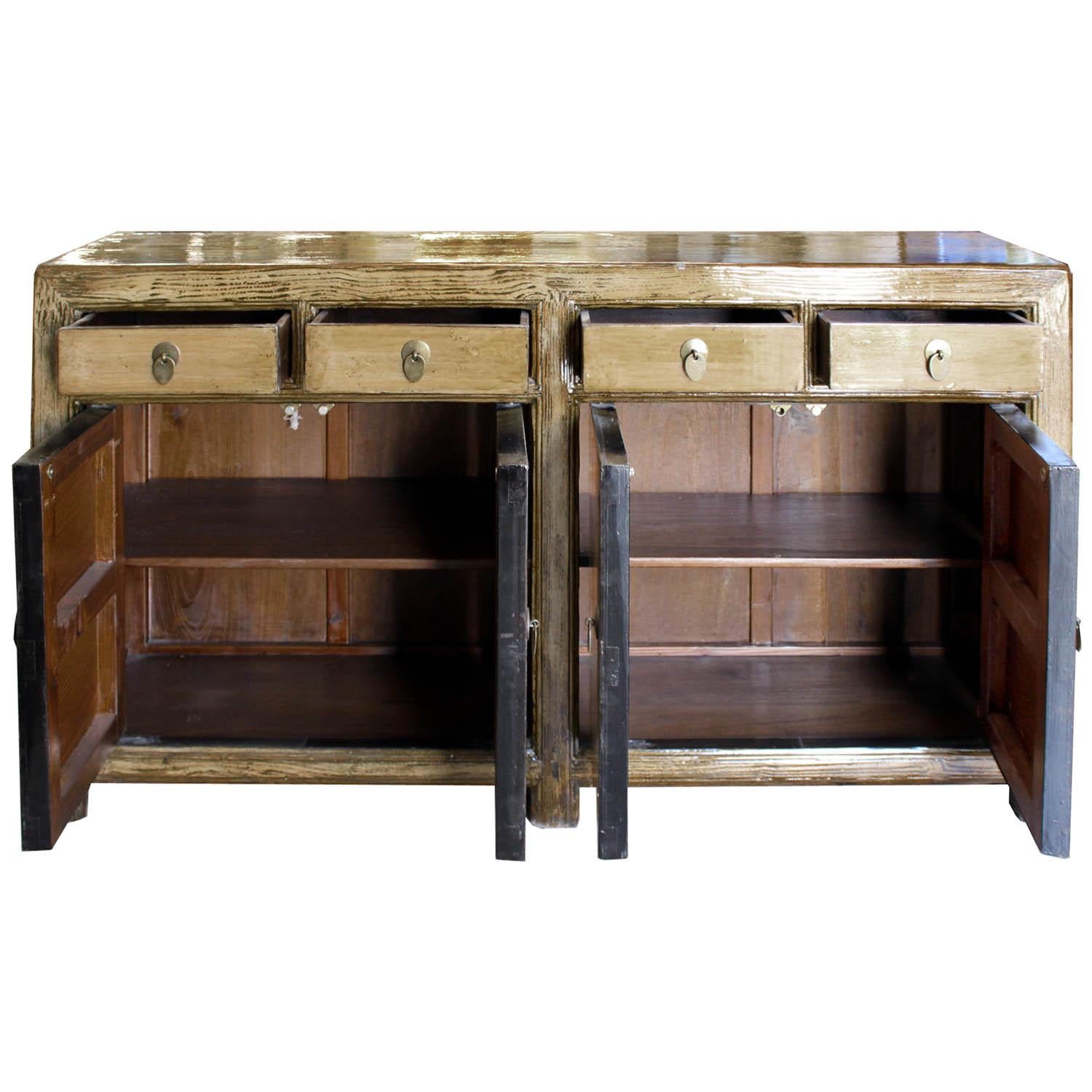 Four-drawer sideboard with elegant hand-painted parchment lacquer color could sit behind a sofa or be used as a server in a dining room. New interior shelves and hardware.