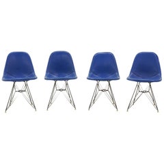 Four Eames Black Wire DKR Dining Chairs, Eiffel Tower Bases, Blue Bikini Covers
