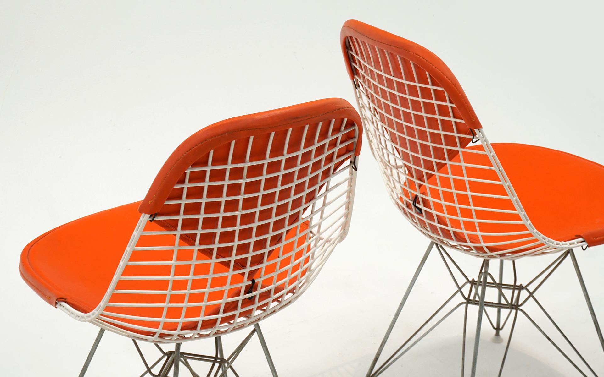 American Four Eames White Wire DKR Dining Chairs, Eiffel Tower Base, Orange Bikini Covers