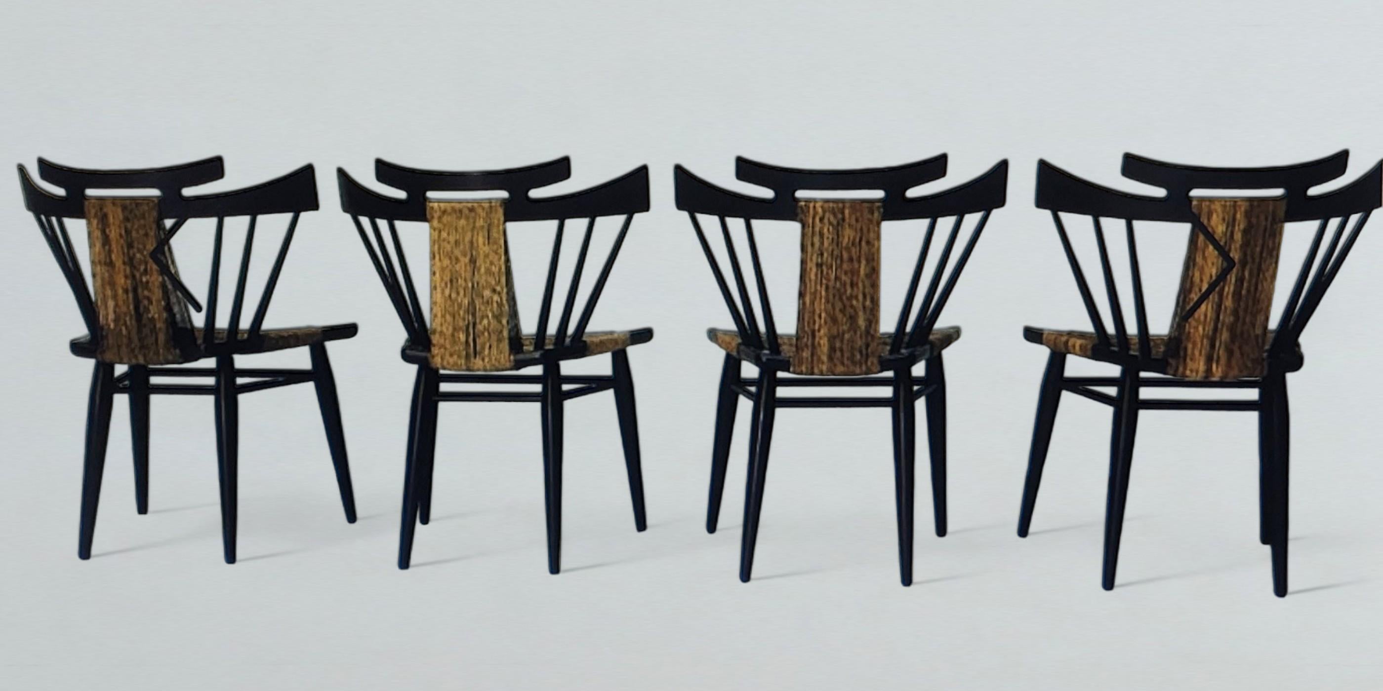 Four vintage Yucatan side chairs by Edmund Spence for his Mexican manufacturer Industria Mueblera, circa 1958. The solid mahogany framed spindle back chairs with their original woven sea grass seats and sea grass banding are unusual combination.
The
