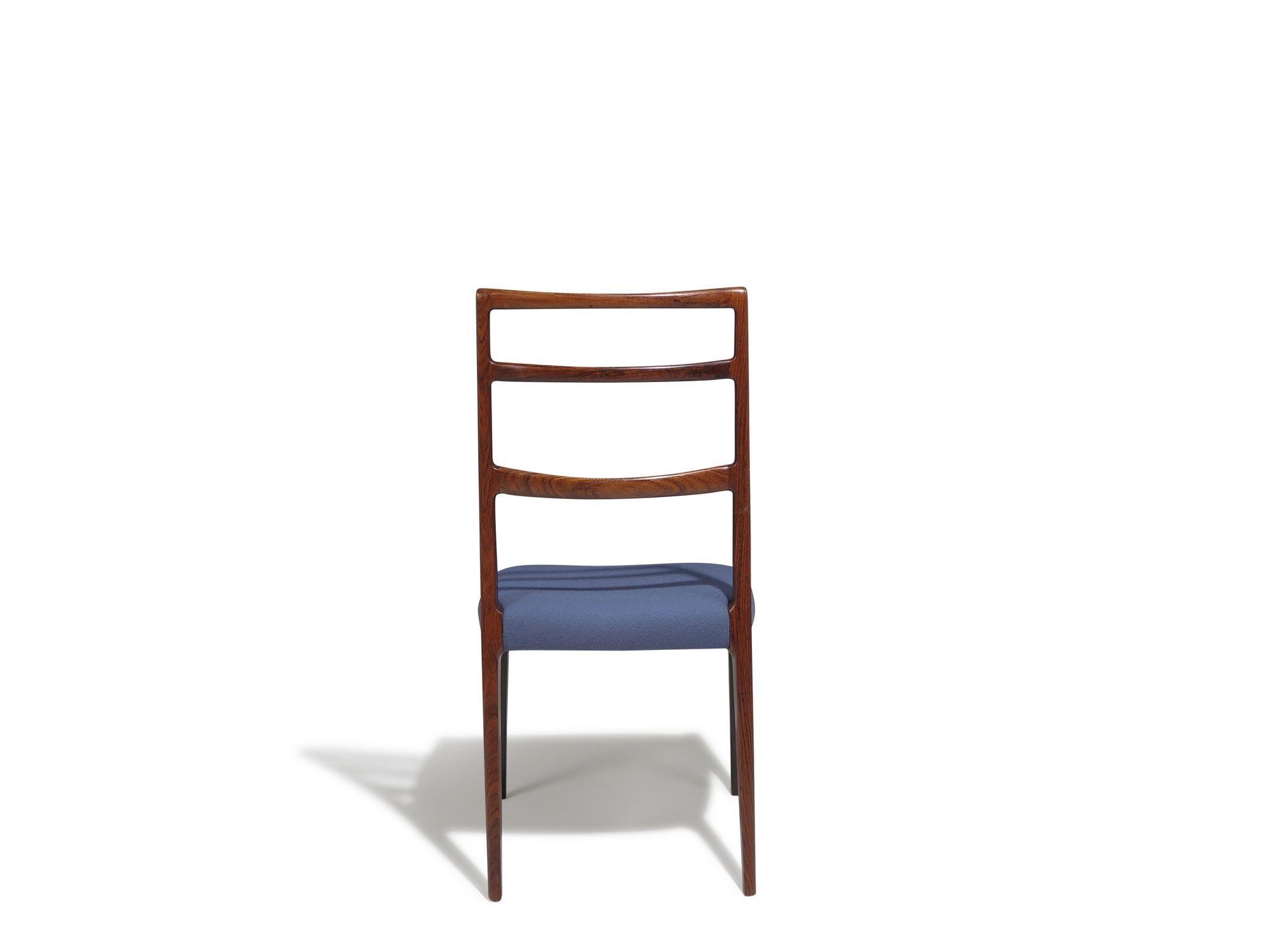 Quatre élégantes chaises de salle à manger danoises à haut dossier en bois de rose brésilien en vente 3