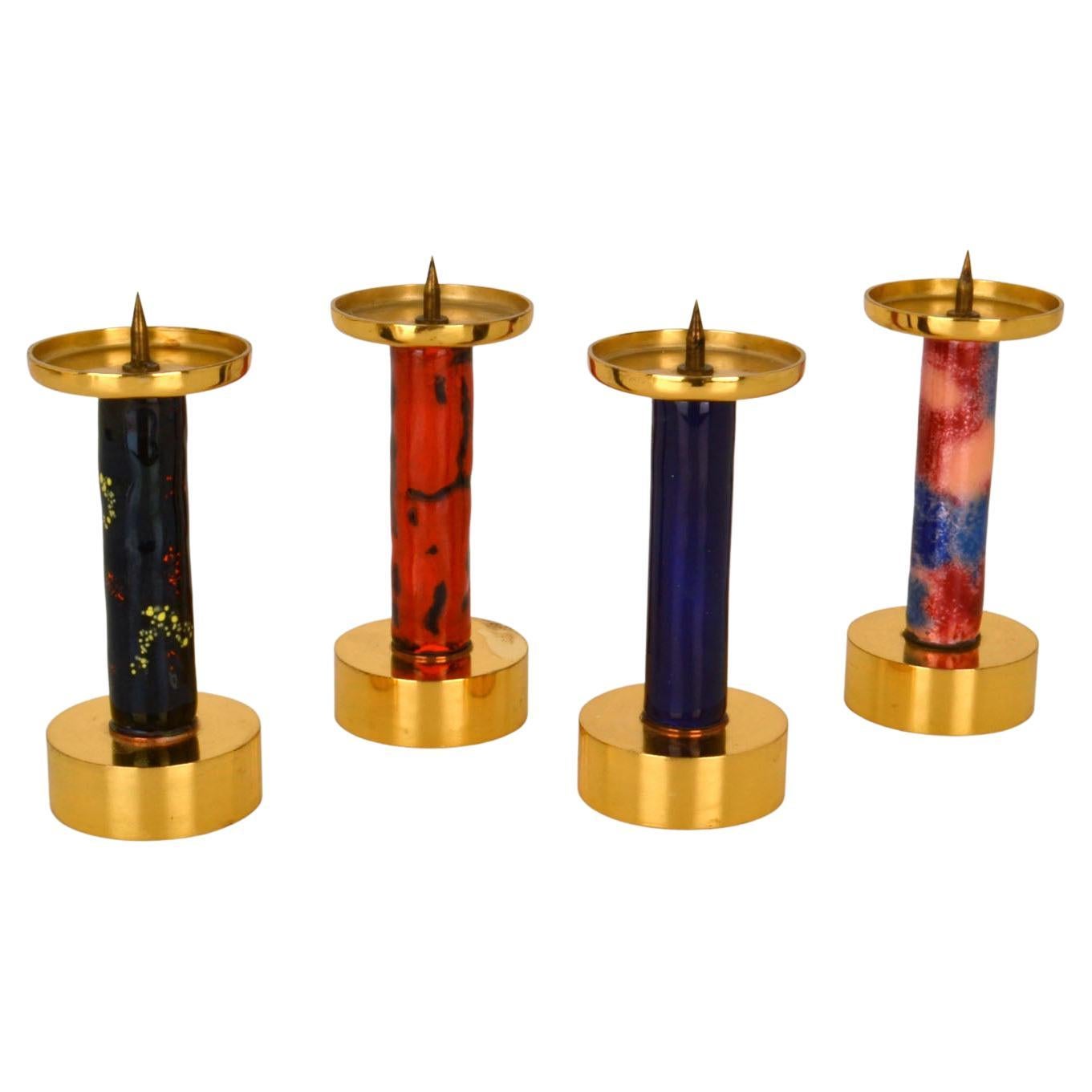Four Enameled and Gilded Brass Candle Sticks For Sale