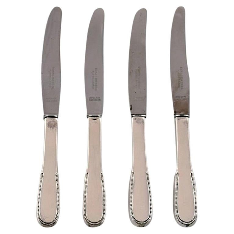 Four Evald Nielsen Number 14 Small Lunch Knives in Hammered Silver For Sale