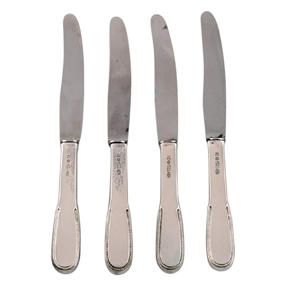 Four Evald Nielsen Number 14 Small Lunch Knives in Hammered Silver For Sale