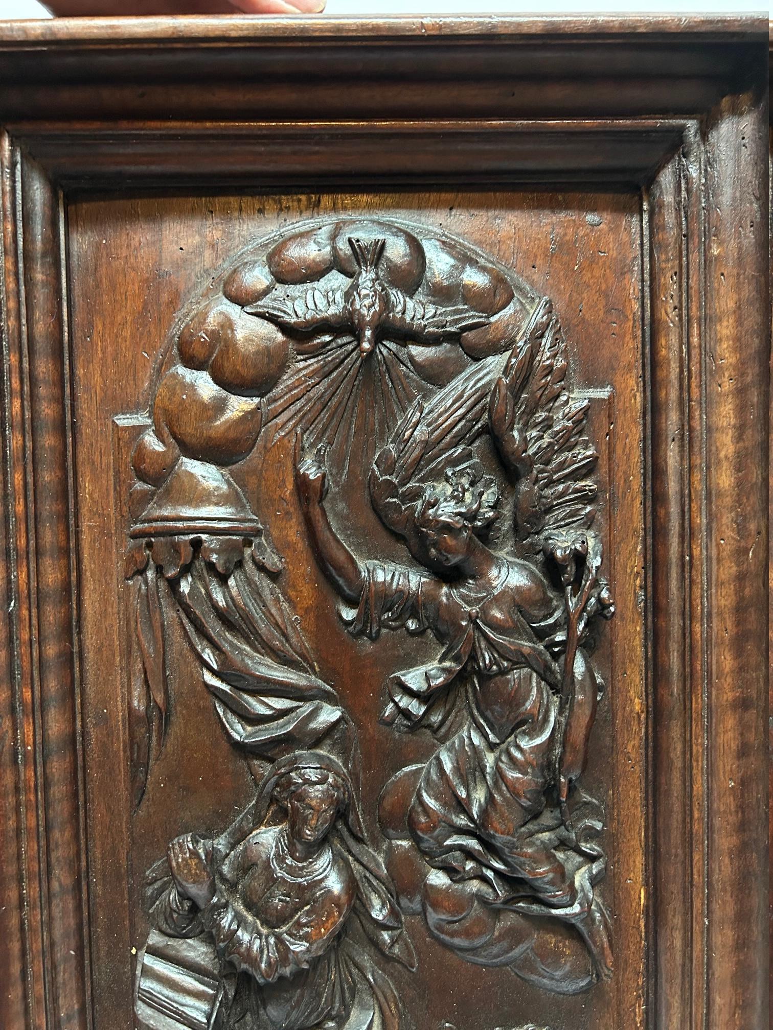 Carved 17th  Century Walnut French sculptures, depicting the Annunciation. For Sale