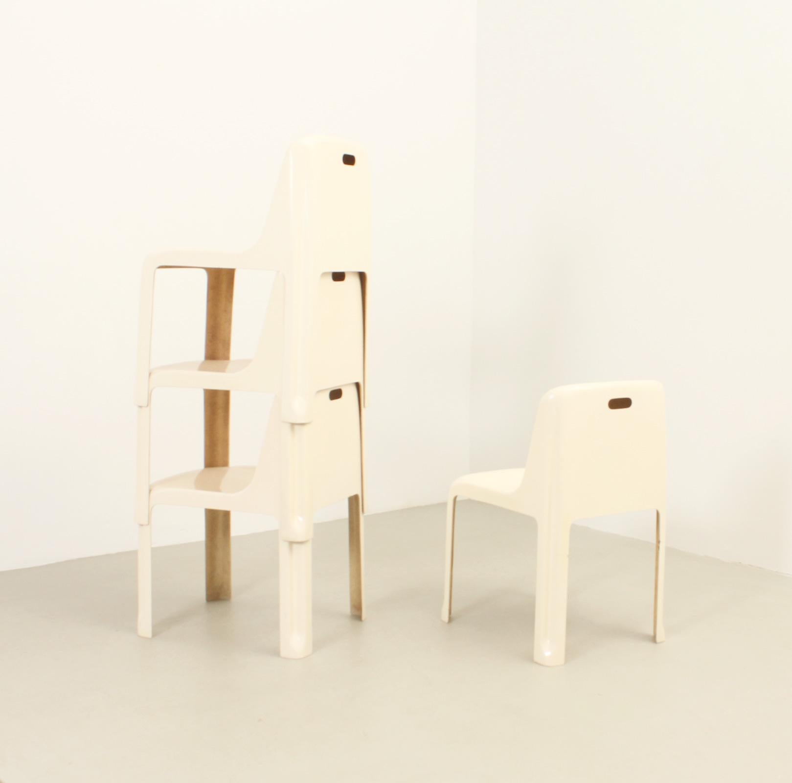 Set of four fiberglass dining chairs model 35 designed in 1971 by Antoni Blanc and produced by Diseños Blanc, Spain. Very hard to find chairs from this designer best known for the large number of lamps he designed. 