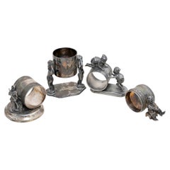 Four Figural Victorian Silverplate Napkin Rings
