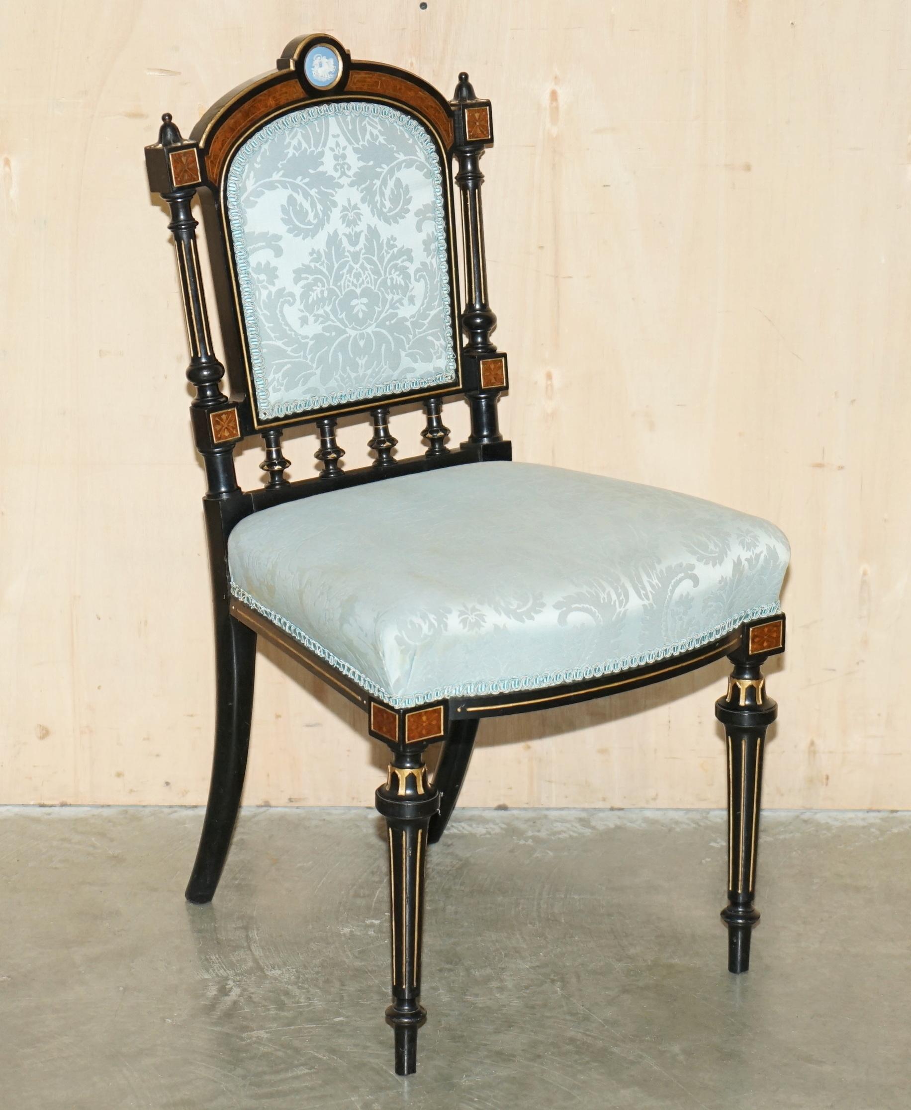 Royal House Antiques


Royal House Antiques is delighted to offer for sale this suite of four very rare, highly collectable Burr Walnut & Ebony framed Victorian Aesthetic Movement dining chairs with a inset Grand Tour plaques that are part of a