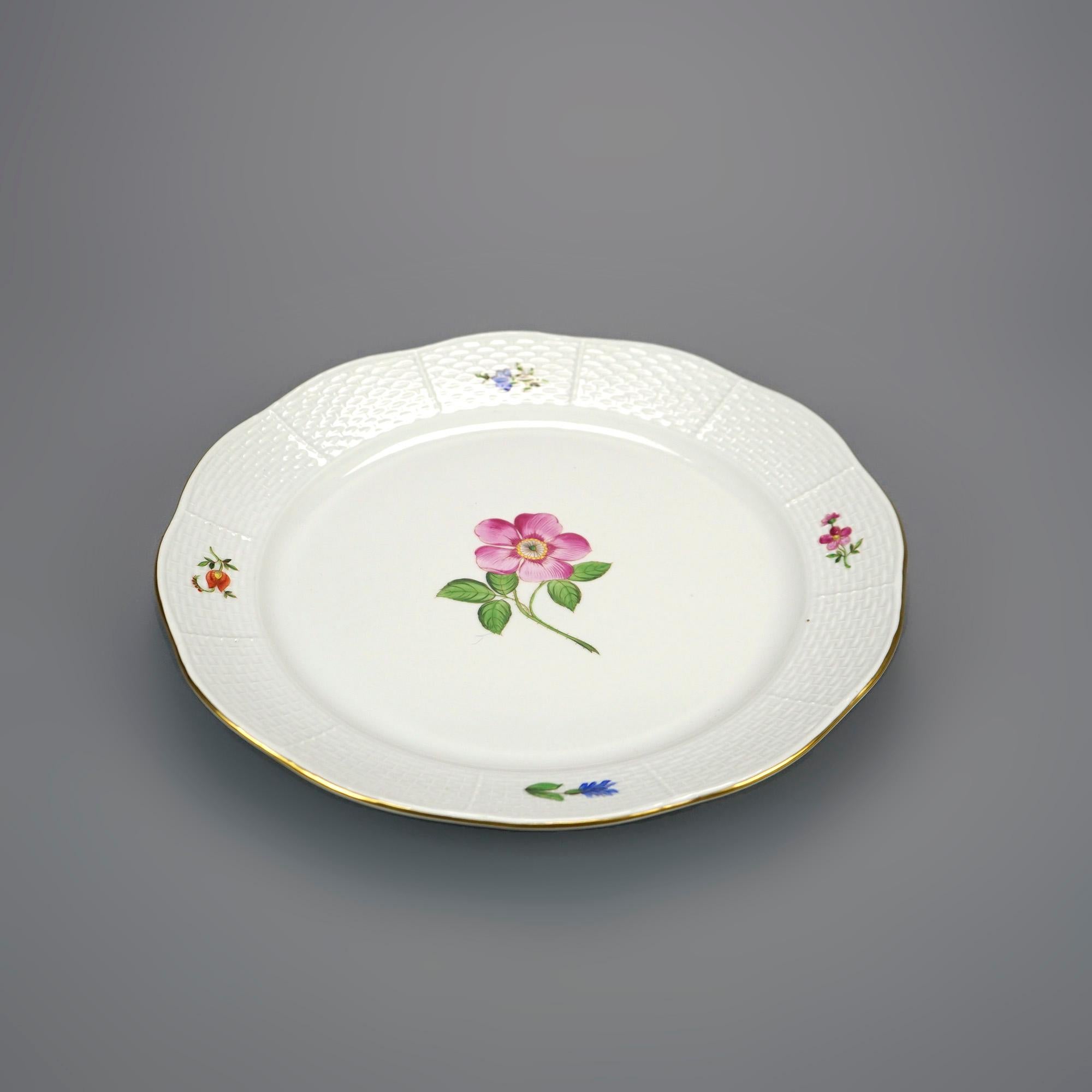 A set of four serving pieces by Herend offer fine china with floral decorated wells and gilt rims, en verso maker mark as photographed, 20th century

Measures- Platter 10.75'' H x 14.5'' W x 1.25'' D; Relish 2''H x 9.75''W x 9.75''D; Deep dish