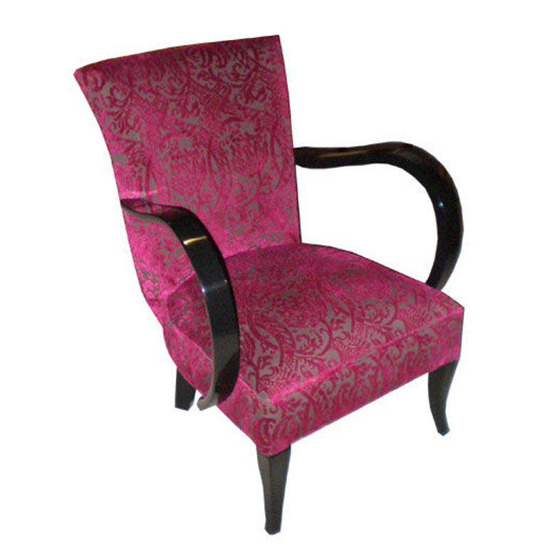 Set of four French Art Deco club chairs with black lacquered trim and new pink and gray floral upholstery.  
The seat height is 15”
Back height is 31”
Front to back is 26”
Arm to arm is 24 ½”
Arm height is 24”
