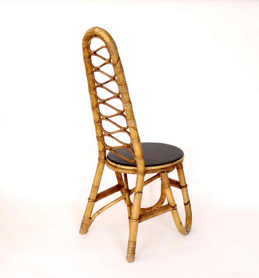 Four French Bamboo and Rattan French Riviera Sculptural Dining Chairs circa 1970 In Good Condition In Chicago, IL
