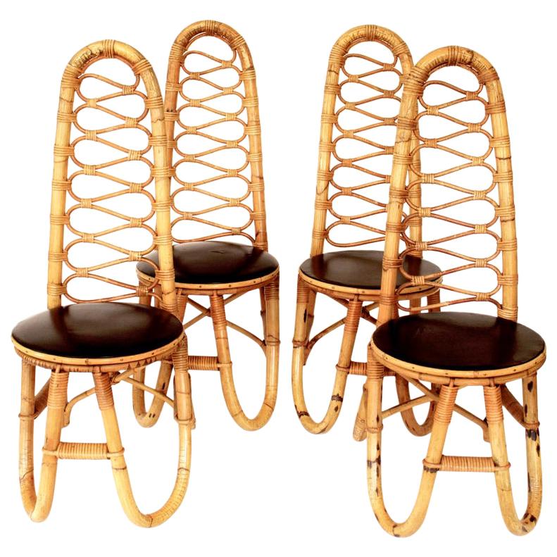 Four French Bamboo and Rattan French Riviera Sculptural Dining Chairs circa 1970