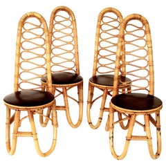 Four French Bamboo and Rattan French Riviera Sculptural Dining Chairs circa 1970