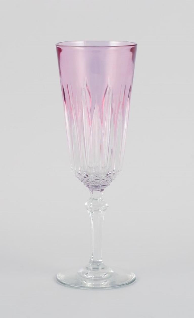 Four French champagne flutes in crystal glass.
Classic design in purple glass.
Mid-20th century.
In perfect condition.
Dimensions: H 18.7 cm x D 6.5 cm.