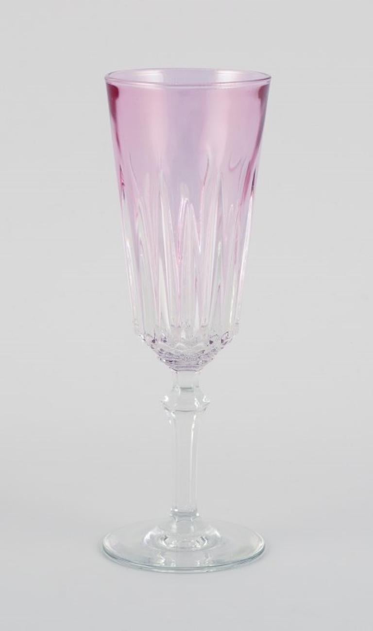 20th Century Four French champagne flutes in crystal glass. Classic design in purple glass.