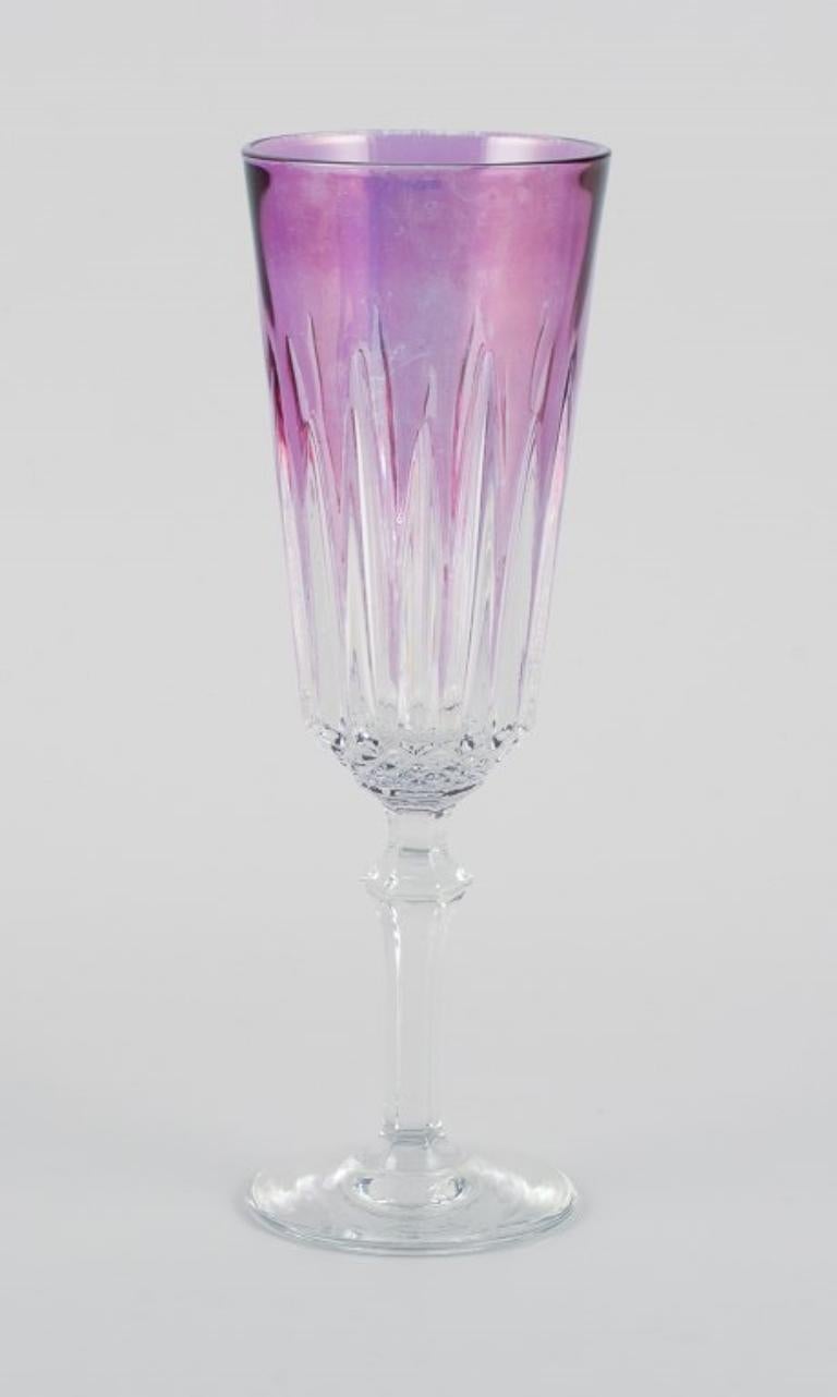 Crystal Four French champagne flutes in crystal glass. Classic design in purple glass.