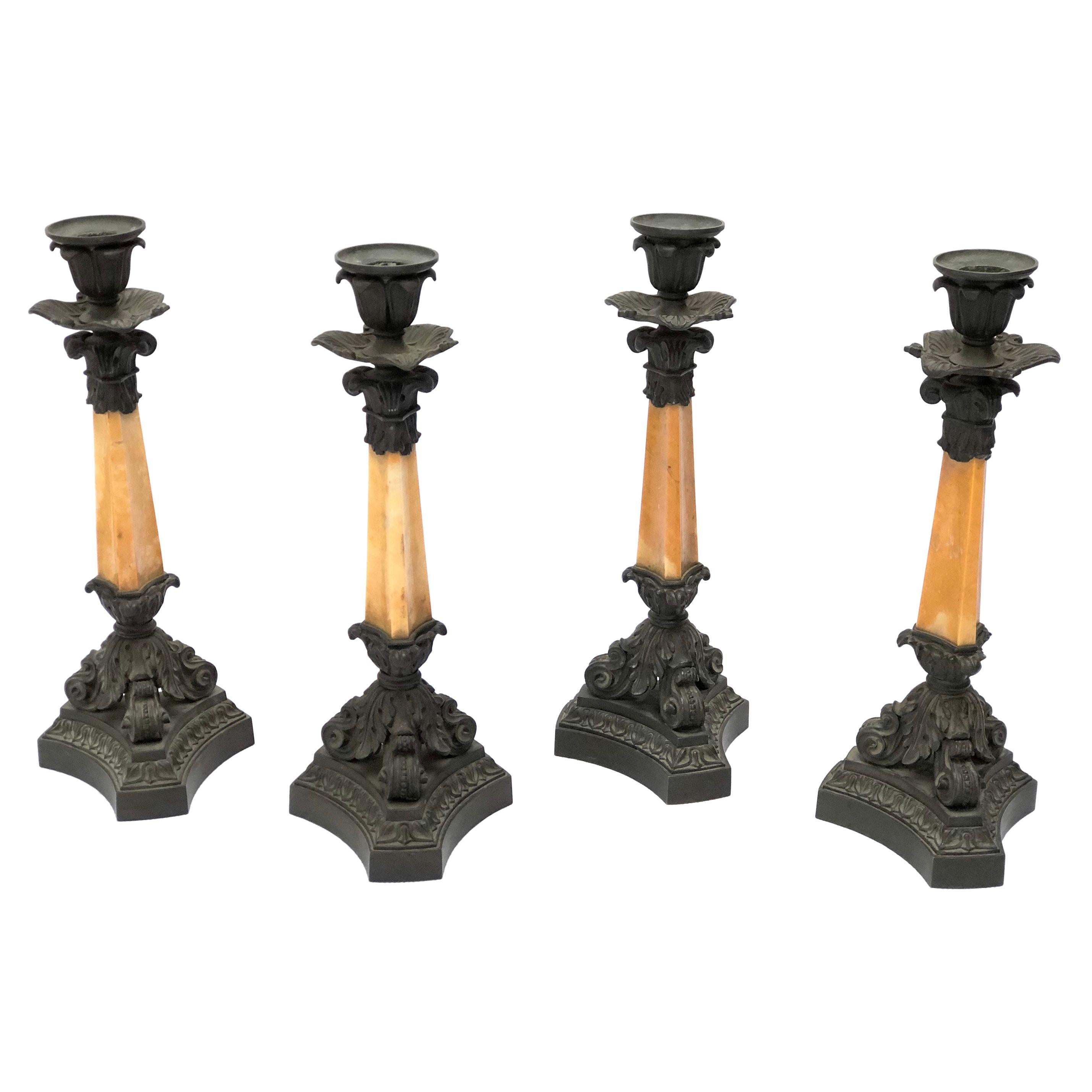 Four French Mid-19th Century Bronze and Sienna Marble Candlesticks by Deniere