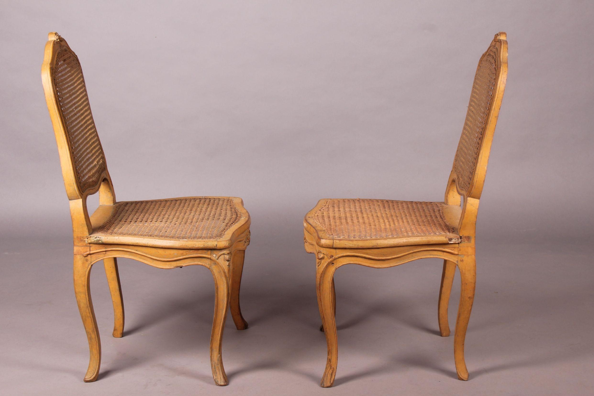 Four French painted Louis XV caned Provincial chairs, the canage is torn in three places.