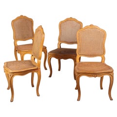 Four French Painted Louis XV Caned Provincial Chairs
