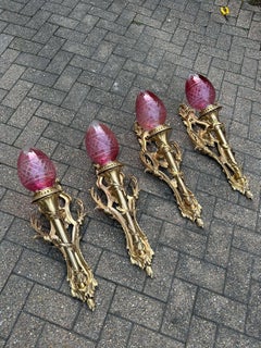 Four French Rococo Revival Gilt Bronze Wall Lights with Cranberry Cut Glass