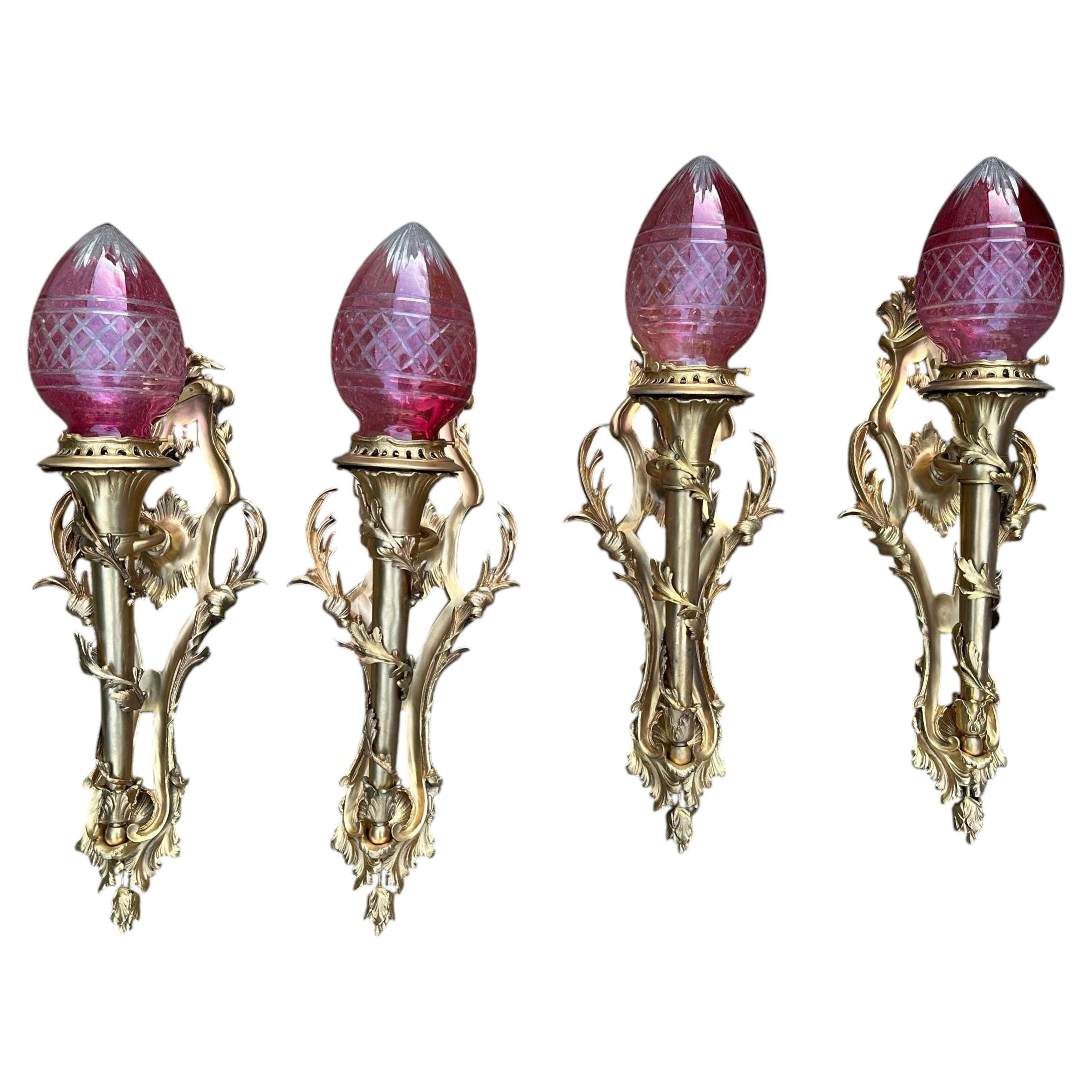 Four French Rococo Revival Gilt Bronze Wall Lights with Cranberry Cut Glass For Sale