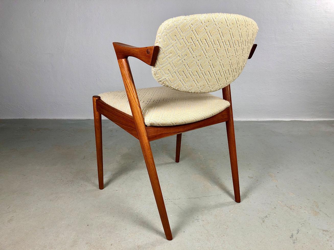 Teck Quatre chaises de salle à manger personnalisables Kai Kristiansen en teck en excellent état en vente