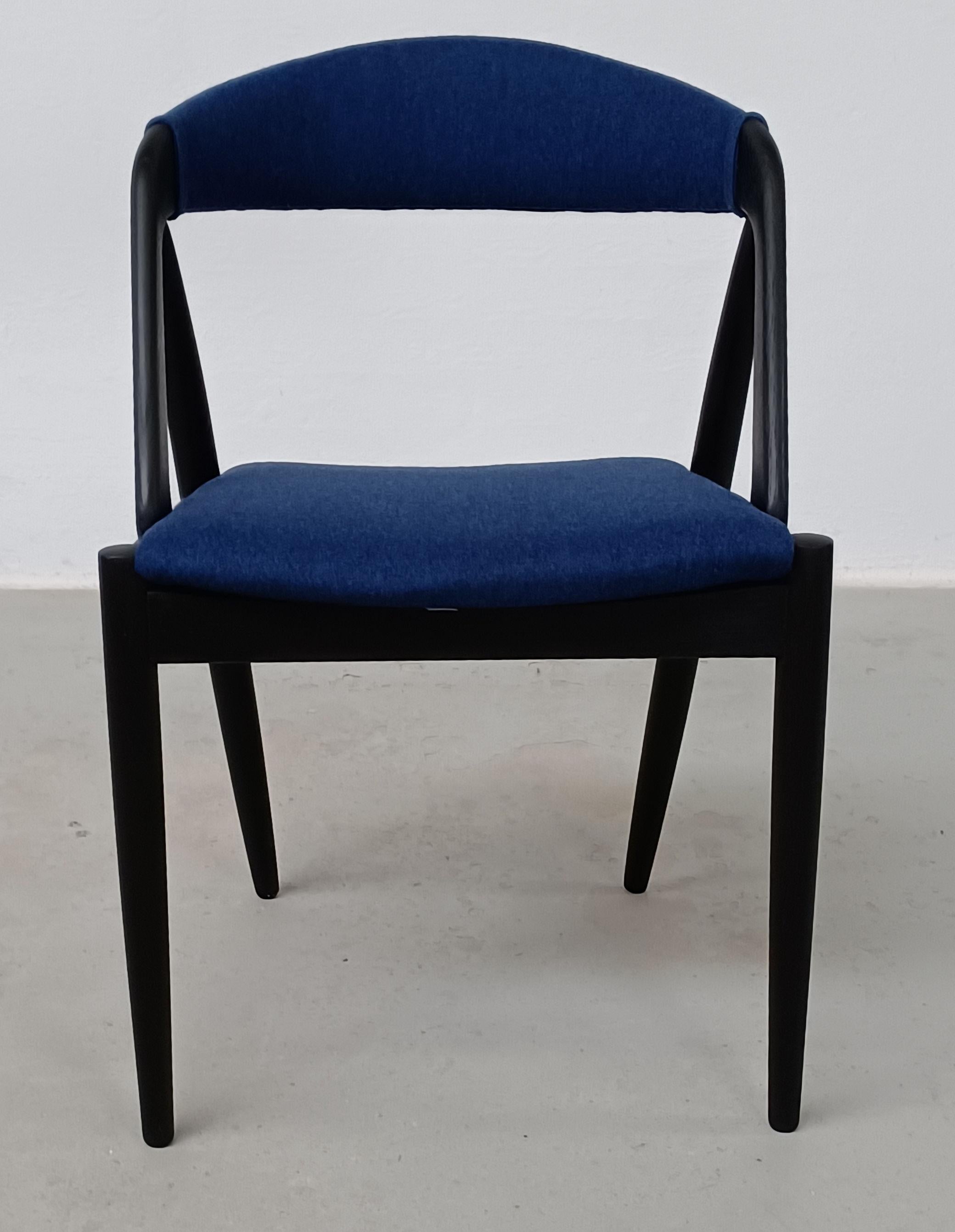 Set of four fully restored ebonized and reupholstered Kai Kristiansen Oak Dining Chairs

The A-frame model 31 dining chairs were designed by Kai Kristiansen in 1956 for Schou-Andersens Møbelfabrik and the A-frame chair is one of the most well-known