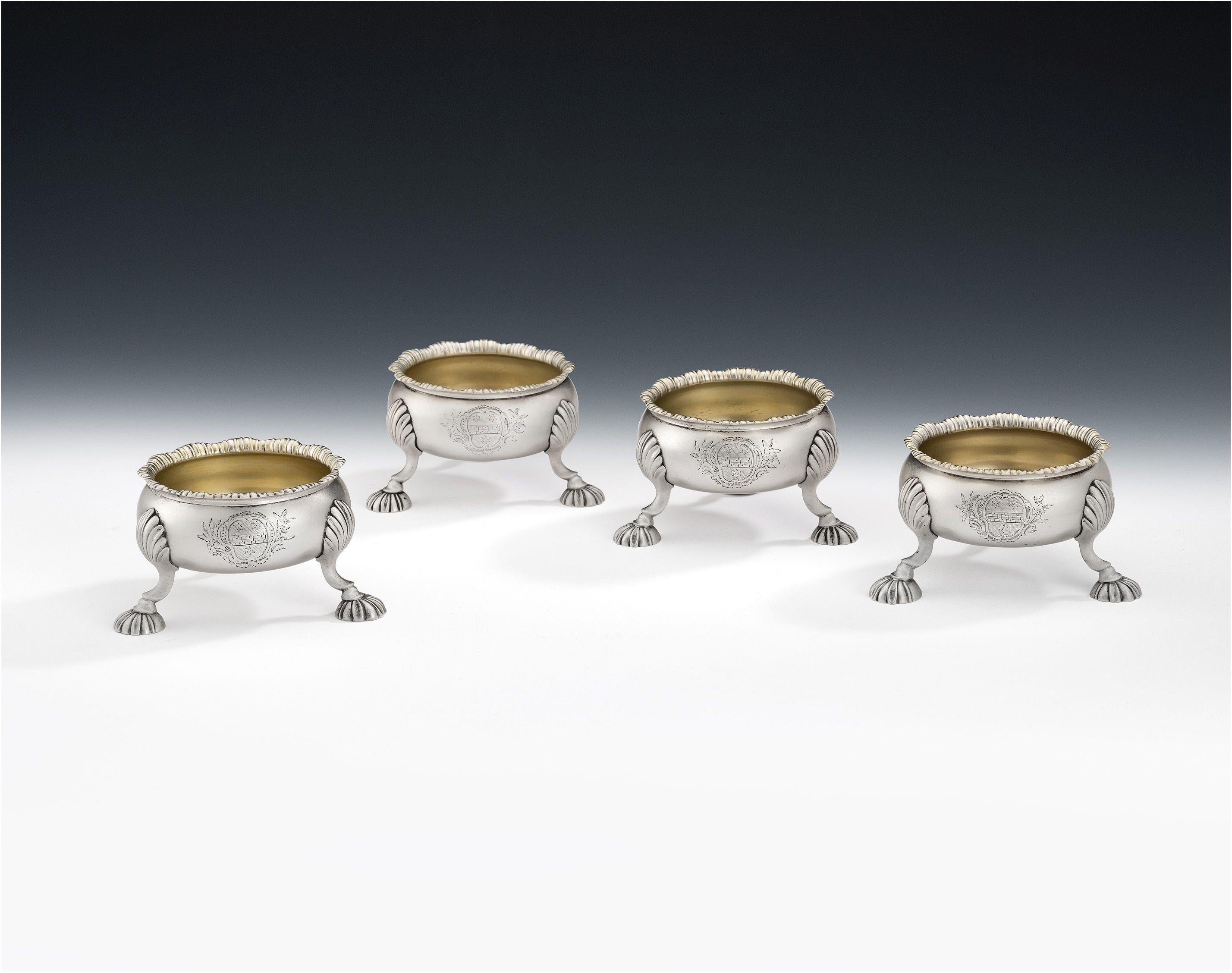 This exceptional set of four George II Armorial Cauldron Salt Cellars were made in London in 1757/58 by David Hennell I. This very fine set of Salt Cellars are modelled in the rare 