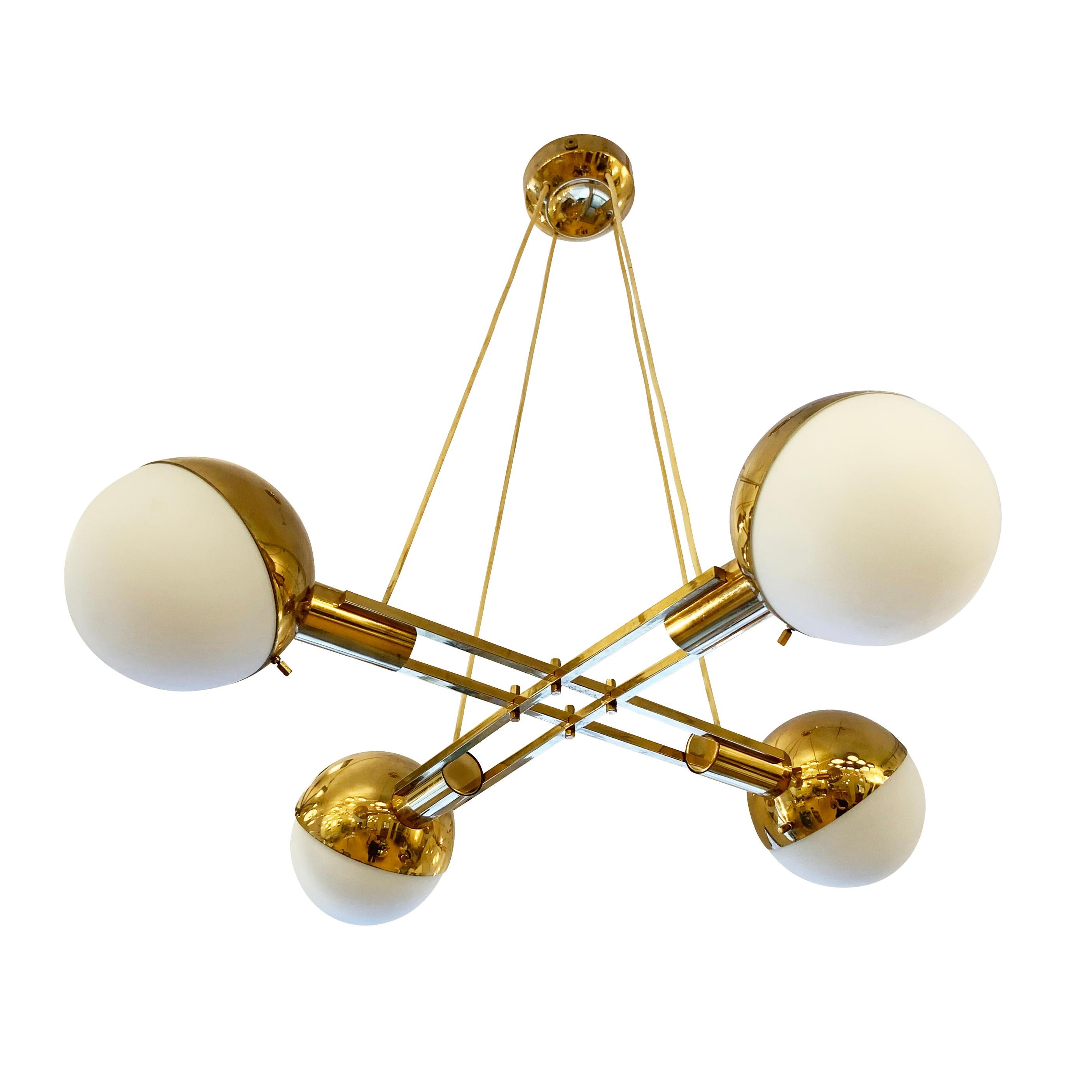 Four Globe Stilnovo Chandelier, Italy, 1960s
$7,500.00
Italian Mid-Century chandelier by Stilnovo featuring four frosted glass globes on a brass frame. Height is adjustable via the suspension cables.

Condition: Excellent vintage condition, minor