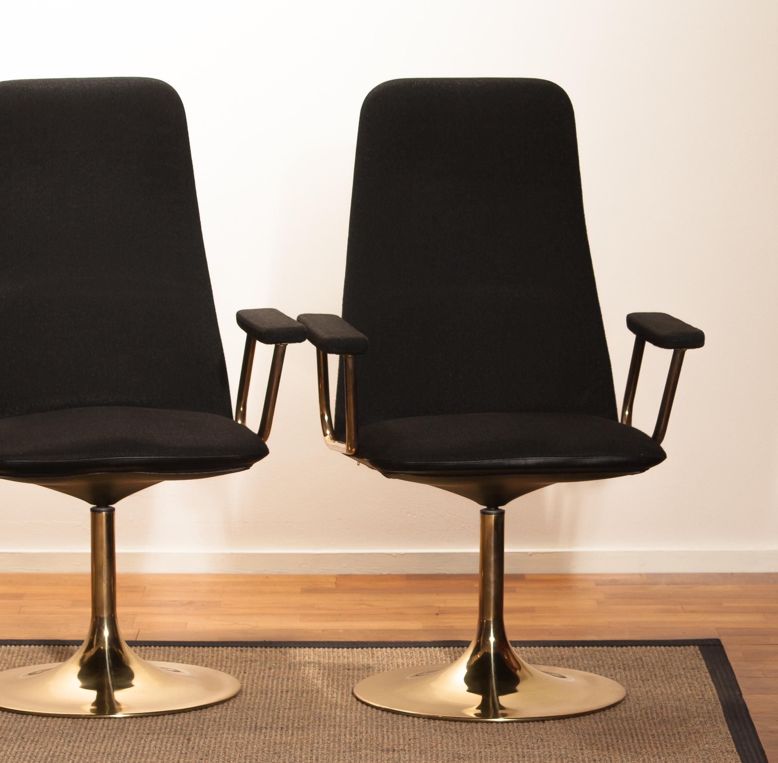 Late 20th Century Four Golden, with Black Fabric, Armrest Swivel Chairs by Johanson Design, 1970