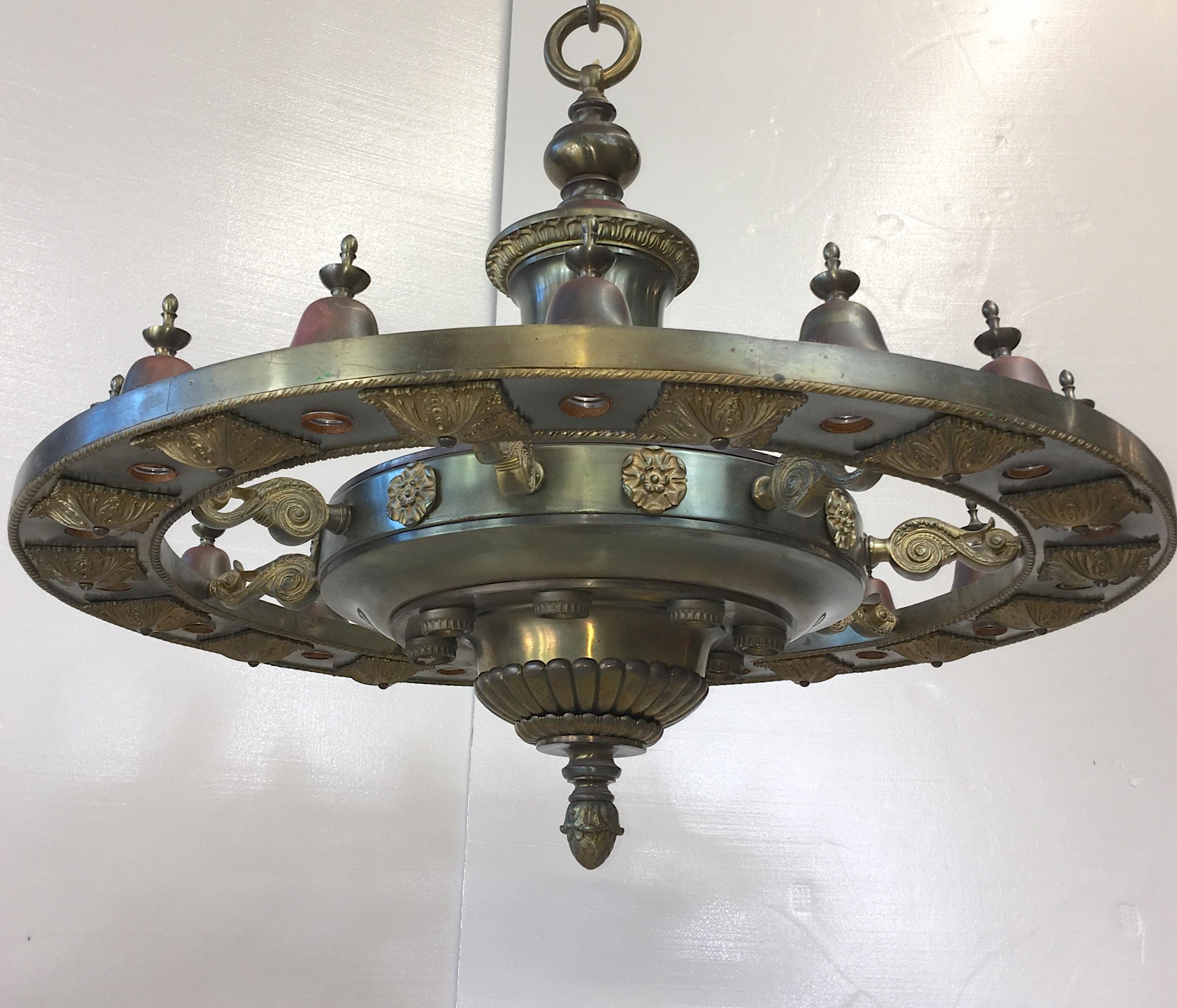 Large bronze and brass chandelier which graced the lobby of the Malden Trust Company bank at 94 Pleasant Street Malden, MA since 1913. The architect was Theodore C. Visscher of NY together with prominent bank builders, Hoggson Brothers who specified