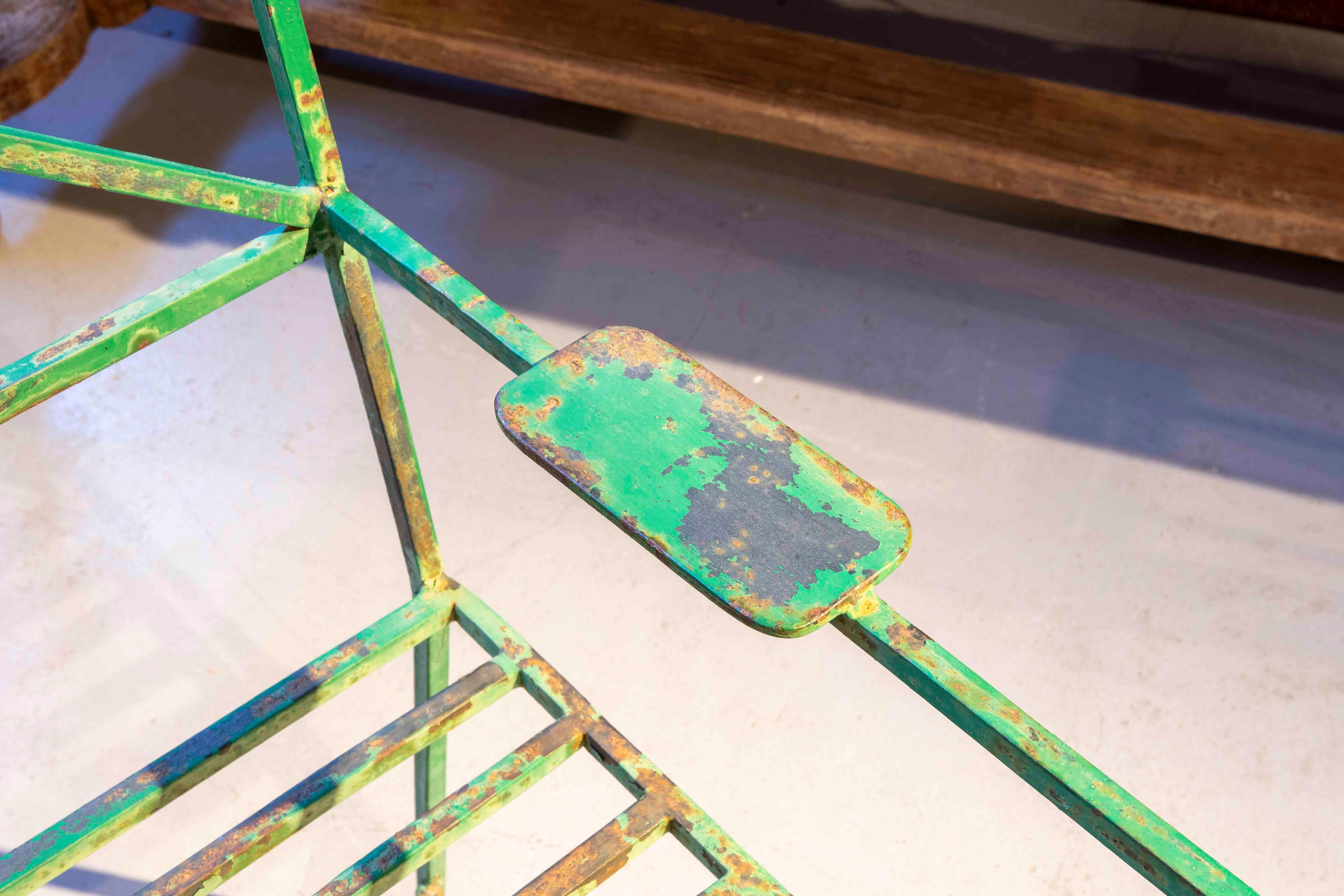 Four Green Painted Iron Chairs with Ants Decoration on the legs 1