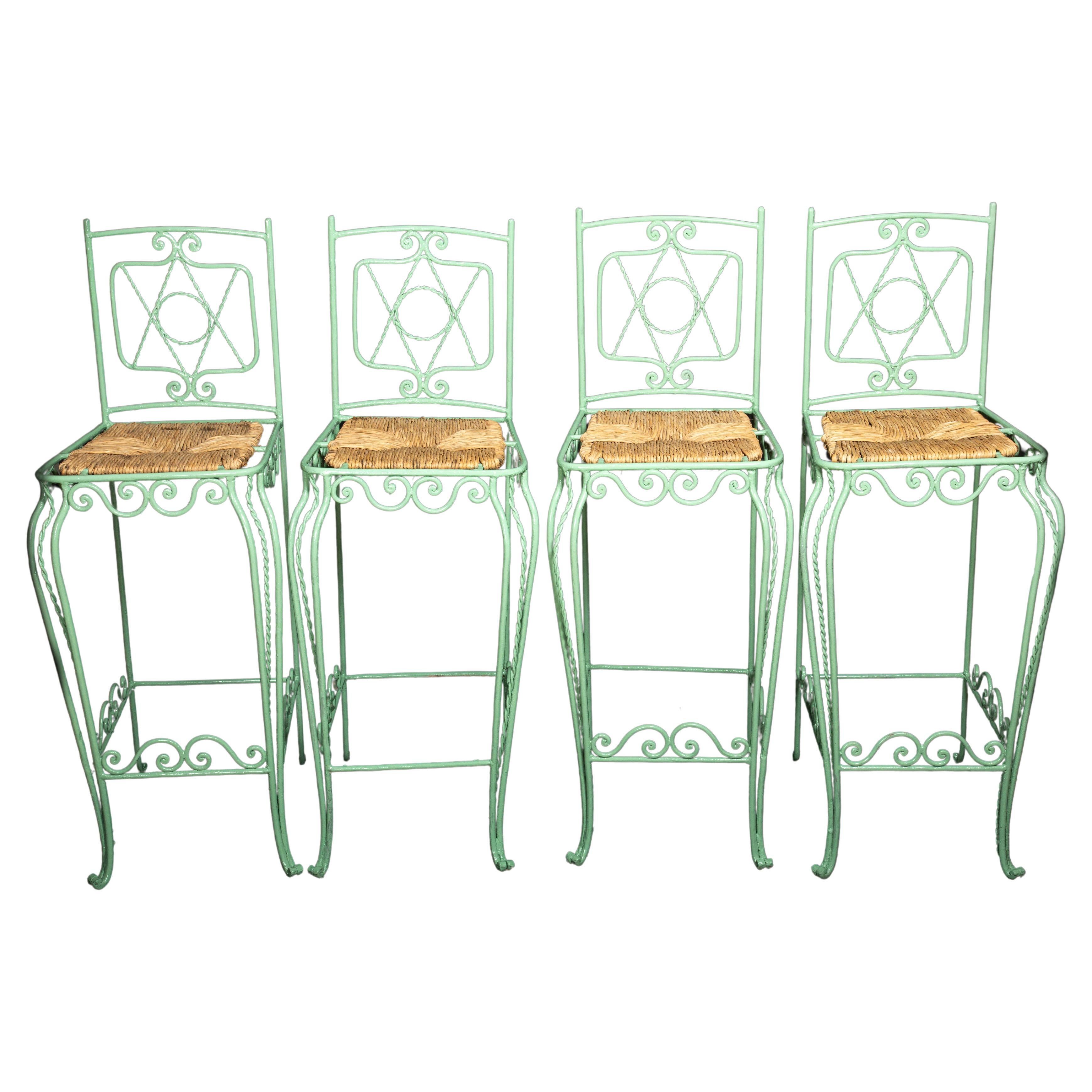 Four Green Painted Metal Bar Stools with Intricate Metal Work