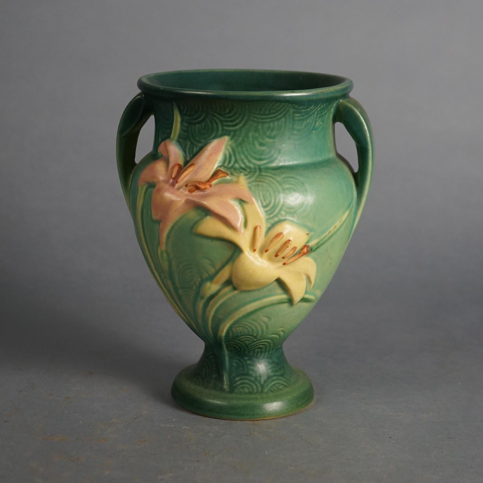Four Green Roseville Art Pottery Items with Zephyr Lily Pattern Mid 20thC

Measures- Vase: 8.5''H x 6.5''W x 6''D