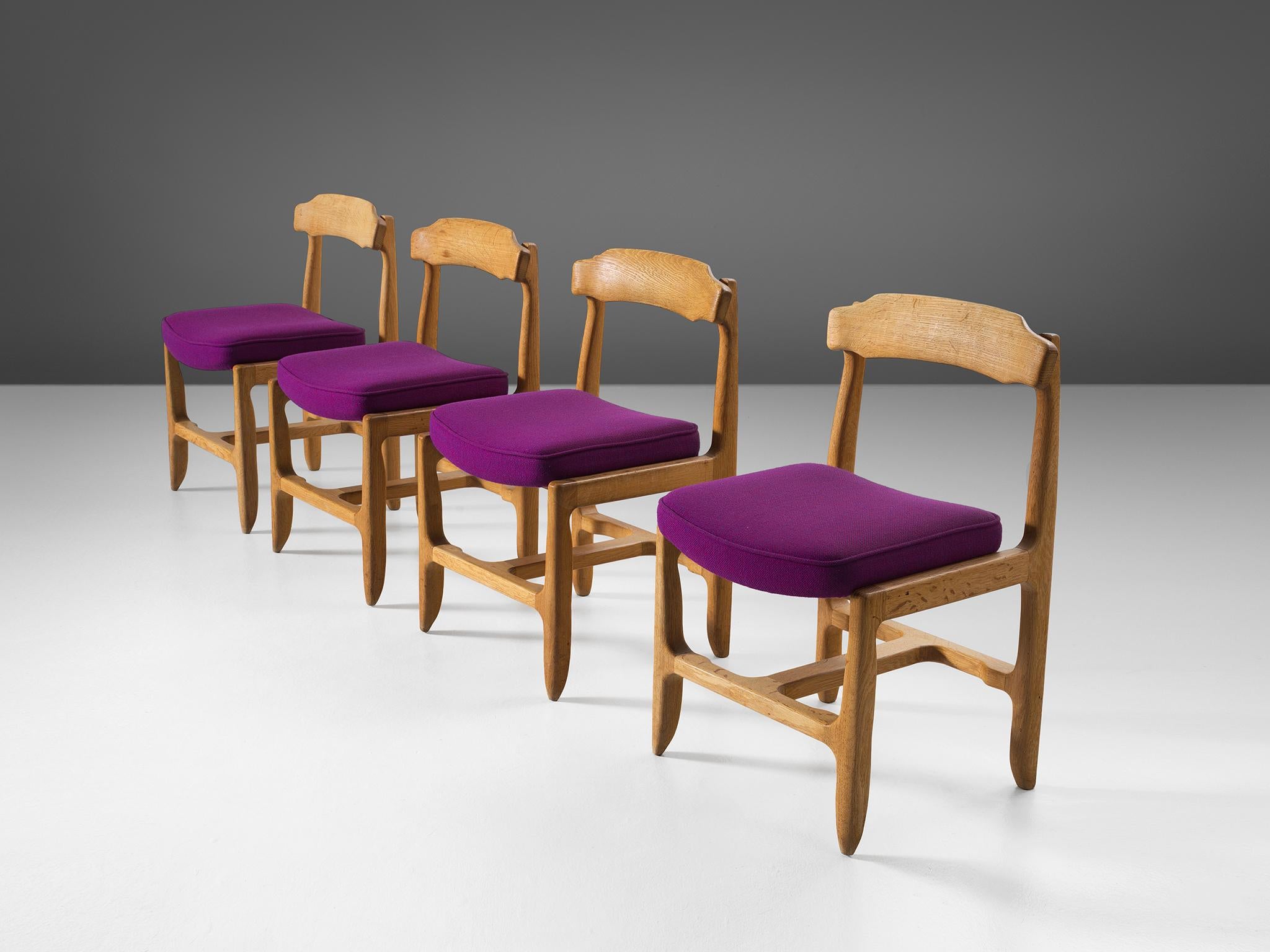 Dining chairs, solid oak and fabric, 1960s.

These distinctive chair in beautifully patinated oak is by the French designer duo Jacques Chambron (1914-2001) and Robert Guillerme, (1913-1990). These dining chair shows organic, tender lines almost