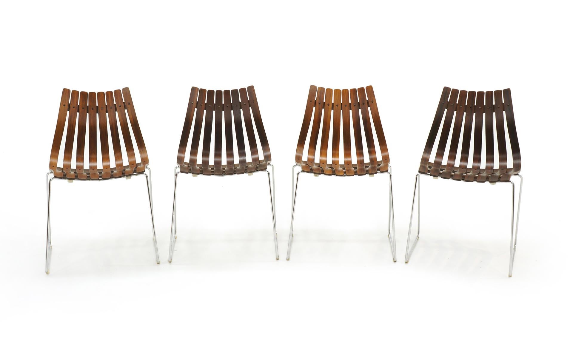 Beautiful set of 4 Hans Brattrud Scandia dining chairs in Brazilian rosewood on chromed steel bases for Hove Mobler Norway. Expertly refinished. Excellent.