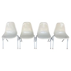 Four Herman Miller Eames Fiberglass Stacking Dining Chairs