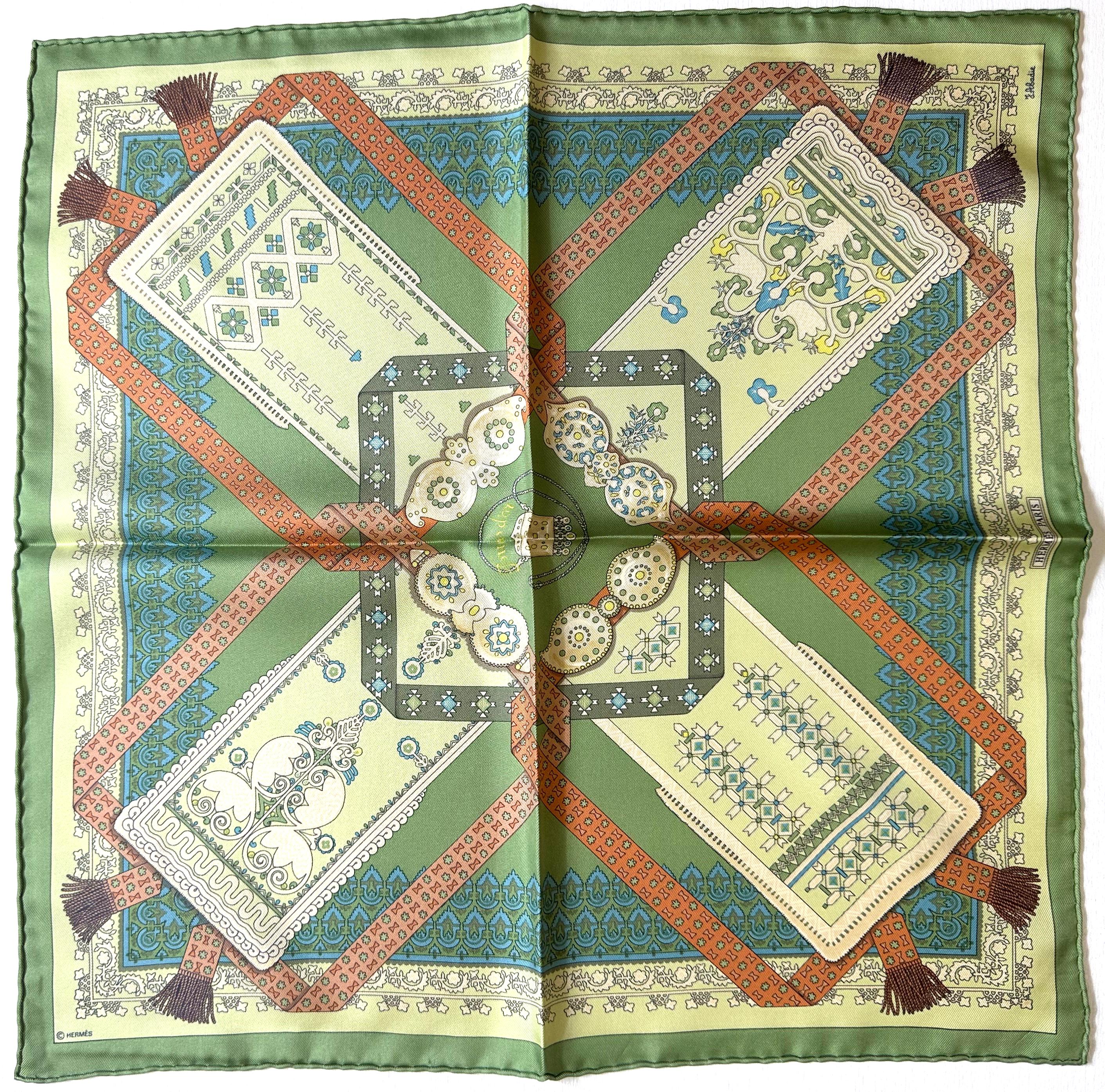Four Hermes Small Silk Scarves
Comprising, Les Cavaliers d Or, Regina, Suns d or and another with a tiger in black and gold on a red ground. (4)
each 16.25 by 16.25 in.
Condition Report
Good condition.

