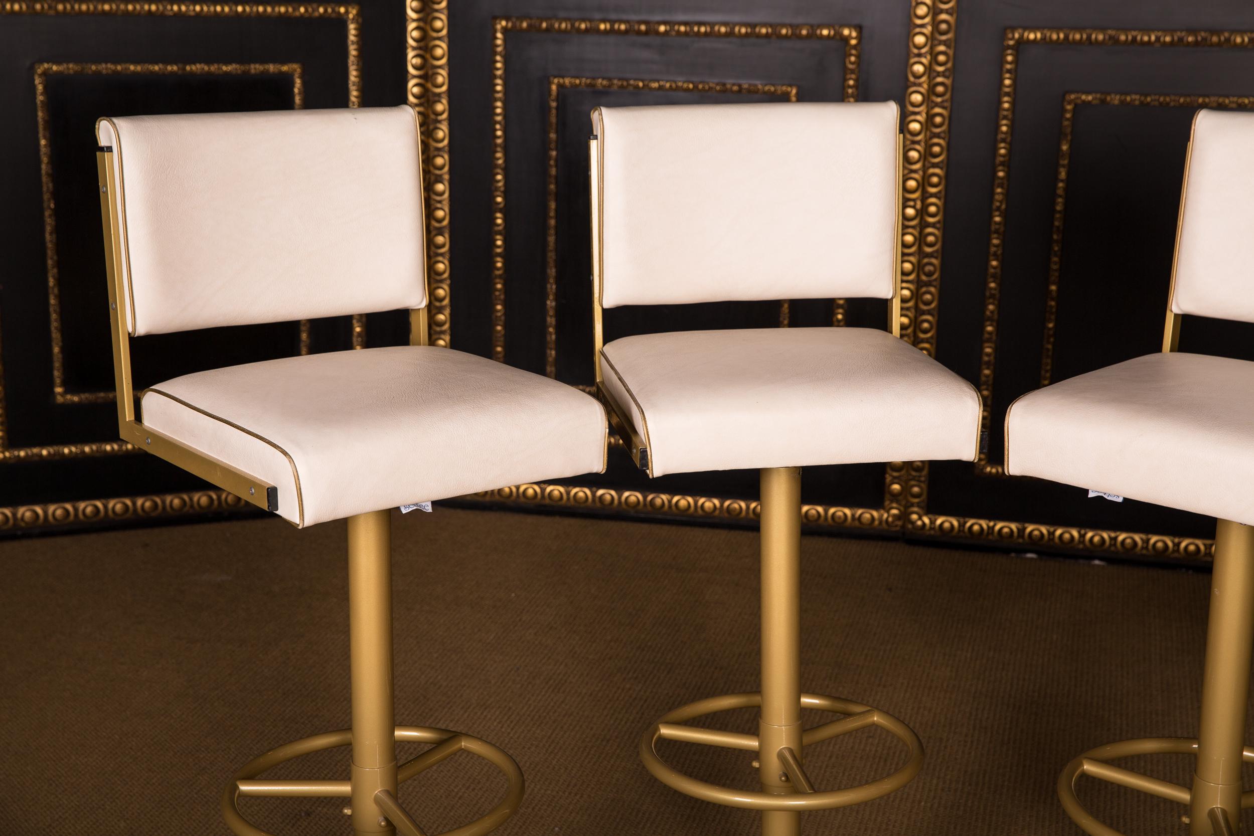 Four heavy, sturdy stools with footrest. The frame is set in gold and the seat is upholstered in leather.
This chairs are not new,its used but in a good condition 