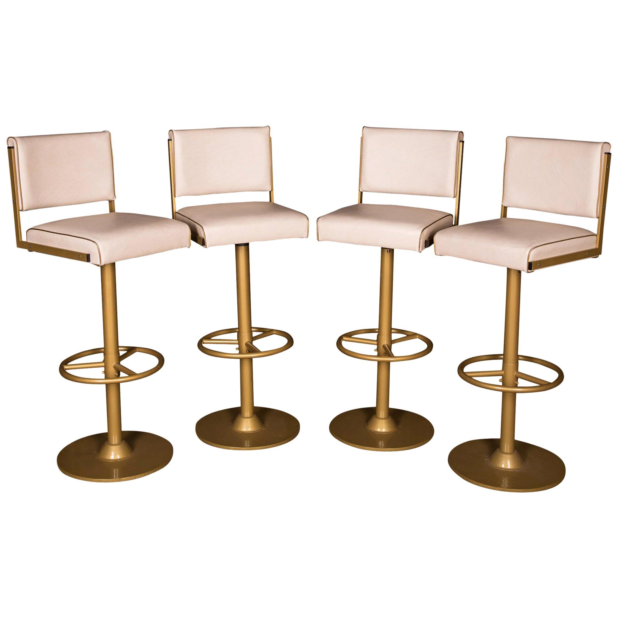 Four High Quality Bar Stools Made of Metal in Golden Color